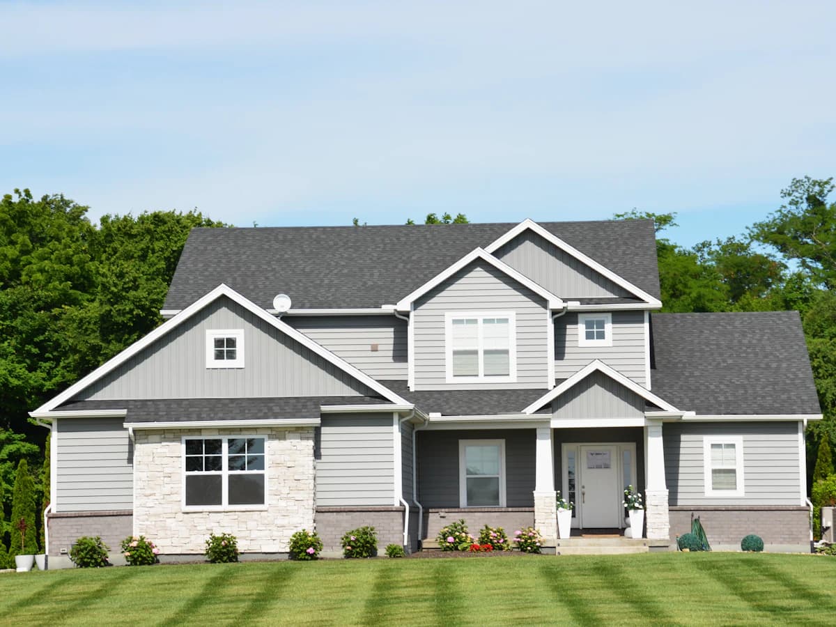 The front of a suburban house with a lawn